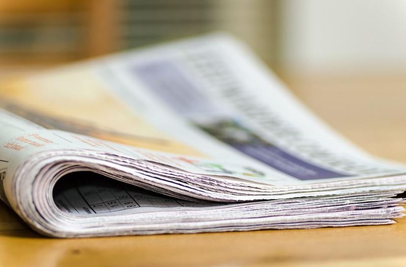 a newspaper on the table