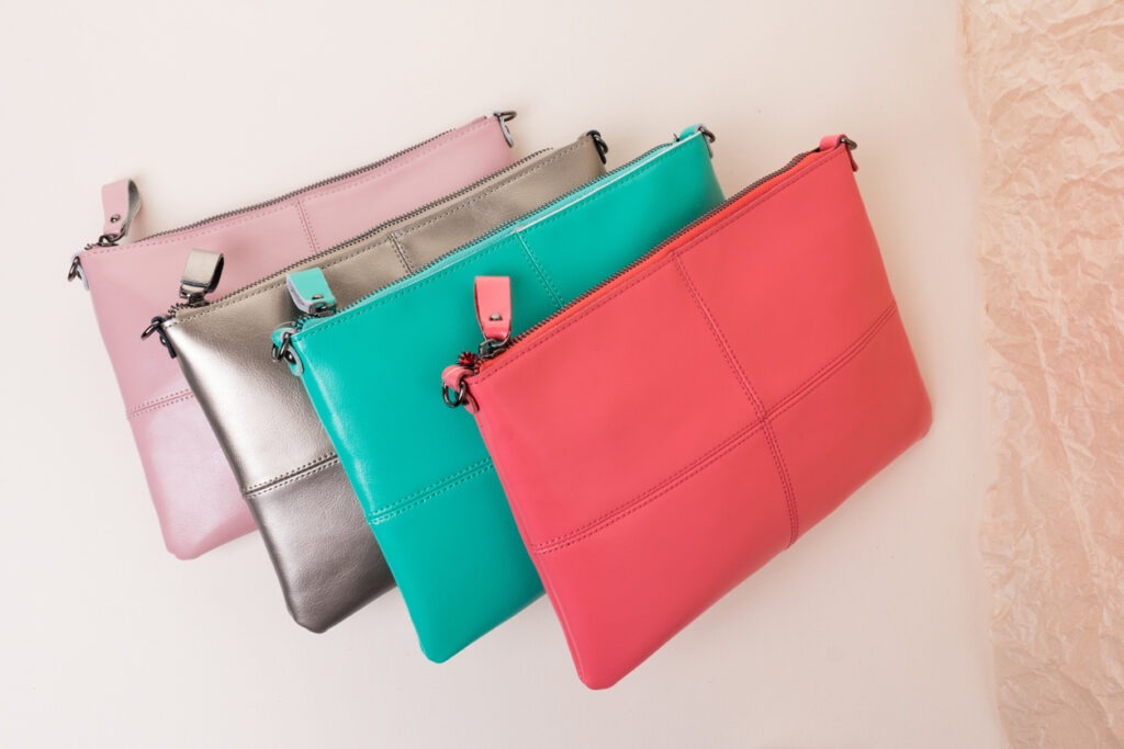 clutch bag, fashionable, four objects, leather, gift, purse, retail, advertisement, bag