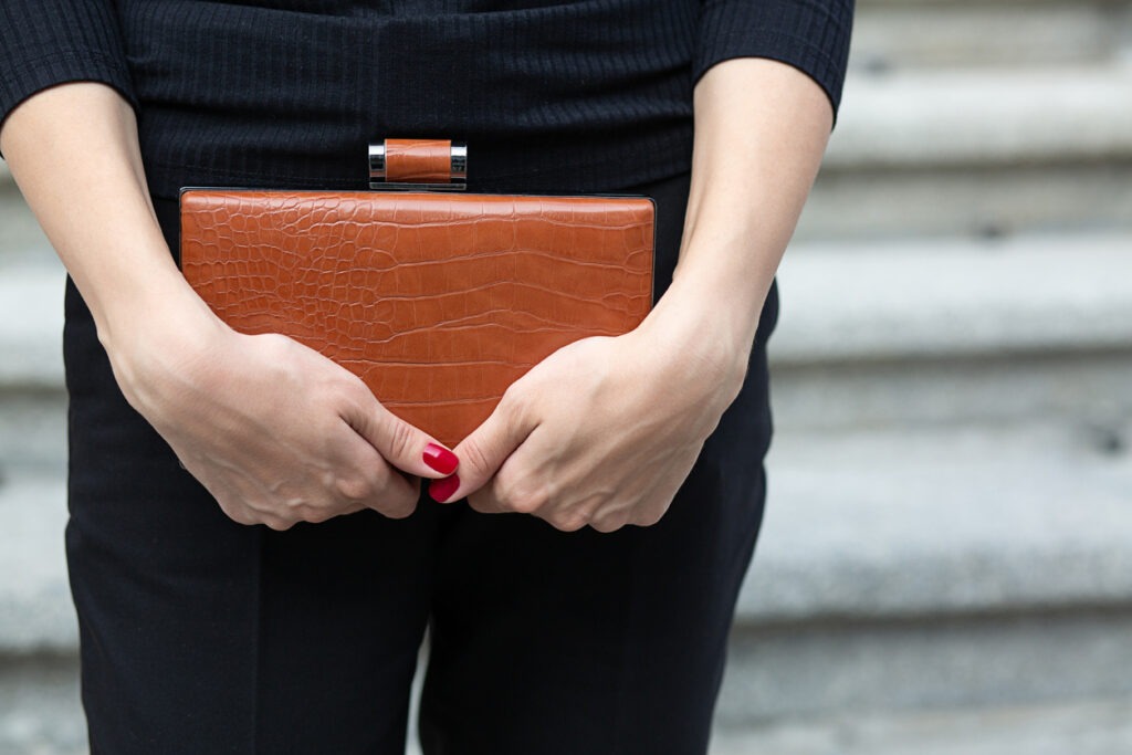 clutch bag, opening, adult, adults only, bag, busy, color image, discovery, fashionable, female, finding, horizontal, lifestyle, looking