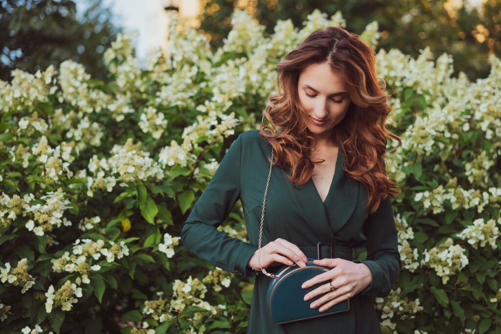 women, purse, one woman only, elegance, dress, green color, small, hand, environmental conservation, clutch bag, beautiful woman, springtime, outdoors, bag, fashion model