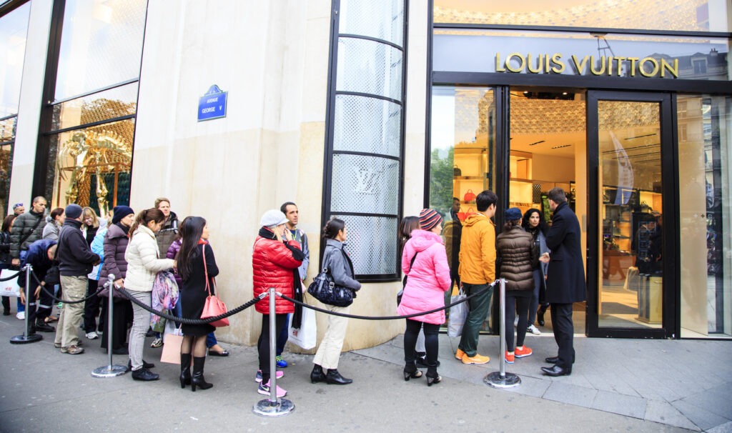 store, waiting in line, shopping, luxury, buying, retail, boutique, tourism, architecture, building entrance, business, capital cities, city life, consumerism, customer, design